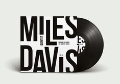 a black and white record with the words miles davis printed on it's side