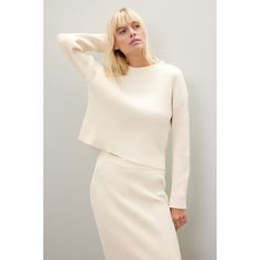 Cream knit (100% Polyester). Sweater. Long sleeves. Crewneck. Pull on. Imported. Cozy Sweater With Ribbed Neckline For Work, Cozy Stretch Tops For Work, Ribbed Cropped Sweater For Fall Workwear, Fall Ribbed Cropped Sweater For Work, Fall Cropped Sweater With Ribbed Neckline For Loungewear, Ribbed Cropped Sweater For Fall Loungewear, Beige Ribbed Stretch Sweater, Cozy Fitted Ribbed Knit Top, Cozy Ribbed Fitted Knit Top