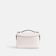 Our structured Cassie crossbody has classic good looks and ample room to hold everyday essentials with three organized compartments. A more compact version of the original the 17 is crafted of refined pebble leather and finished with our iconic turnlock closure. Style the versatile bag three ways: carry by hand with the ladylike top handle wear on the shoulder with the elegant chain strap or crossbody with the adjustable leather strap. | Coach Cassie Crossbody Bag 17 - Women's Designer Crossbody Elegant Double Flap Bag For Daily Use, Classic Bag With Double Flap For Daily Use, Classic Double Flap Bag For Daily Use, Coach Pebbled Leather Satchel With Detachable Strap, Timeless Everyday Flap Bag With Turn-lock Closure, Timeless Flap Bag With Turn-lock Closure For Everyday, Classic White Saddle Bag With Detachable Strap, Elegant Travel Saddle Bag With Turn-lock Closure, Classic White Flap Bag