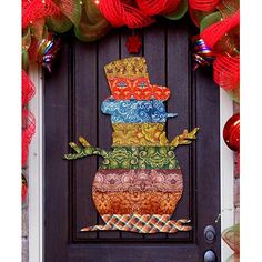 a door decorated with many colorful items and decorations