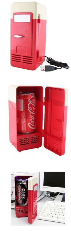 an open coca cola cooler sitting on top of a desk