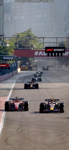 Charles Leclerc & Sergio Perez | Azerbaijan Grand Prix - Sprint Race 2023 | F1 Wallpaper | Photo By: Mark Thompson / Getty Images