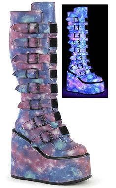 Swing your way into the club with this series of platform wedged boots and shoes, with buckles and straps and decals galore! Vegan Purple-blue reflective PU leather 5 1/2 inch platform wedge Knee length 8 straps w/ buckles Metal plates Side zip U.S women's sizing-refer to size chart for more info Please note: these shoes are in our warehouse, ready to ship. If your size isn't available, your can preorder a pair here. Platform Knee High Boots, Demonia Boots, Goth Shoes, Purple Boots, Gothic Boots, Demonia Shoes, Attitude Clothing, Patent Boots, Kawaii Shoes