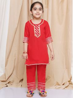 **Specifications : Please visit our brand store** https://www.etsy.com/in-en/shop/AJDezines?ref=seller-platform-mcnav Specially handcrafted clothing for the perfect look and comfort for the festive season 2 Pc Set : 1 Kurti and 1 Pyjama ||Style:- Kurta Salwar Set For Kids Girls Kurti : Solid Plain Kurti made in Rayon. Pajama : Solid Plain Pajama made in Rayon. Introduce your little one to the timeless elegance of traditional wear with this Girls' 3/4 Sleeve Salwar Suit adorned with Gota Patti de Red Bollywood Cotton Set, Fitted Straight Kurta Sets For Puja, Red Cotton Matching Set, Festive Matching Pant Set For Eid, Traditional Red Cotton Sets, Festive Cotton Pant Set For Eid, Cotton Sets For Puja And Festivals, Cotton Sets For Puja During Festivals, Festive Eid Cotton Pant Set