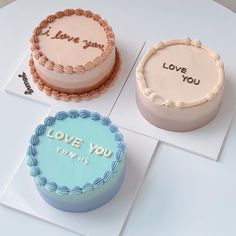 three cakes with the words i love you on them