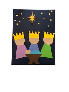 paper cut out of three wise men with a star above them