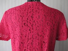 "Amazing original 50s cherry red macramè lace blouse. Round neck and front covered buttoning (pic.1). Short sleeves. Fully lined. Mint conditions. It fits size M Measurements: (lay flat and double chest) Shoulders 15.3\" chest 40.1\" sleeve length 7\" back length 21.2\" Blusa originale anni 50 in pizzo macramè color rosso ciliegia. Collo tondo e bottoncini ricoperti (foto 1). Manica corta. Foderata. Ottime condizioni. Taglia M Misure: Spalle 39 cm seno 102 cm lungh.manica 18 cm lungh. dietro 54 Fitted Red Lace Top, Fitted Lace Collar Top With Short Sleeves, Fitted Lace Top With Short Sleeves And Lace Collar, Lace Party Blouse With Short Sleeves, Short Sleeve Lace Top With Lace Collar For Party, Red Lace Blouse, It Fits, Red Lace, Cherry Red