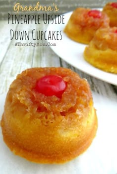 pineapple upside down cupcakes on white plates with text overlay that reads grandma's pineapple upside down cupcakes