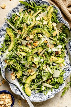 Beautiful and simple arugula pear salad with savory asiago cheese, almonds, creamy avocado, and a light white balsamic vinaigrette. This fresh arugula salad has delicious bites of sweet, salty, zippy flavor and tons of wonderful textures for an easy holiday side dish or weekday lunch! Enjoy as is or pair with your favorite protein for a complete meal. Arugula Pear Salad, Sweet Potato Casserole Healthy, Easy Holiday Side Dishes, White Balsamic Vinaigrette, White Balsamic, Holiday Side Dish, Ambitious Kitchen, Pear Salad, Stuffed Sweet Potato Healthy