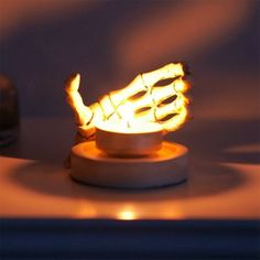 a lit up object sitting on top of a table