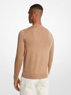 Crafted from pure merino wool, this sweater is a luxe staple piece. It’s warm yet lightweight—perfect for layering throughout the seasons. Style it with casual separates or office-ready pieces. Spring Merino Wool Fine Knit Outerwear, Spring Merino Wool Outerwear With Ribbed Cuffs, Merino Wool Sweater For Spring Workwear, Fall Merino Wool Relaxed Fit Top, Brown Wool Sweater For Spring, Relaxed Fit Merino Wool Tops For Fall, Spring Merino Wool Sweater For Work, Fall Relaxed Fit Merino Wool Top, Fall Merino Wool Top With Relaxed Fit