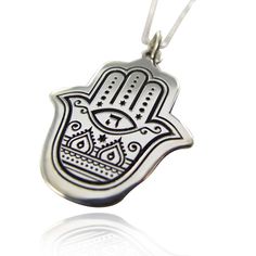 "An Oriental Hamsa pendant with a Hebrew letter ( GOD = 'ה ) in the middle all Silver 925 Each pendant comes with 2 chain a silver 925 chain necklace 16\"(45cm) , Leather necklace with metal clasp and gift box . Size (W22mm) X (L29mm) / Inch (W0.86) X (W1.14) thickness 0.7mm / 0.03Inch Material: Silver 925 Type: Pendant * The letters and Symbols are carved in the Silver Enjoy Your Shopping!" Sterling Silver Pendant Charm Necklace, Sterling Silver Hallmarked Pendant Charm Necklaces, Sterling Silver Hallmarked Pendant Charm Necklace, Sterling Silver Symbolic Pendant Necklace, Symbolic Sterling Silver Pendant Necklace, Sterling Silver Pendant Charm Necklace With Oxidized Finish, Sterling Silver Round Pendant Charm Necklace For Good Luck, Sterling Silver Charm Necklace For Good Luck, Sterling Silver Pendant Amulet Charm Necklace