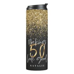 a black and gold glitter can cooler with the words making 40 look good on it