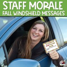 a woman sitting in the drivers seat of a car holding up a sign that says, staff morale fall windshield messages