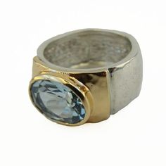 Natural Blue Topaz Oval Gemstone, inlaid in Wide Solid sterling silver ring decorated with Yellow gold, a stunning Ring! 3 reasons why JEWELRY IS A GOOD IDEA: #1-THIS IS THE GIFT THAT CAN LAST A LIFETIME My Jewelry is Fine Jewelry that will stay beautiful, strong, and unique for years! #2- IT'S A 3D PIECE OF LOVE One Duerry Jewelry is like a reminder of 1000 hugs. #3- IT WILL ALWAYS HAVE A GOOD VALUE My jewelry is made with Sterling silver, 9K, 14K, 18K Gold, Precious, and Semi-Precious gemstone Square Diamond Earrings, Garnet Ring Silver, Wide Silver Ring, Sterling Silver Garnet Ring, Bold Rings, Ring Blue, Blue Jewelry, Small Rings, Men's Ring