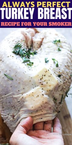 someone holding up a turkey breast on a cutting board with the words, always perfect turkey breast recipe for your smoker