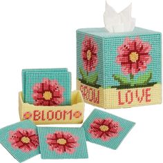 cross stitch tissue box and napkin holder with pink flowers on blue background, no more