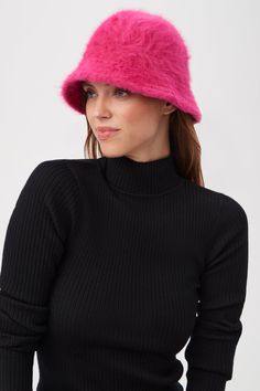 TRINA TURK ACCESSORIESThis pink Angora bucket hat in a standout color brightens up any cold-weather look. Pink Winter Bucket Hat With Short Brim, Lightweight Pink Brimmed Bucket Hat, Fun Pink Bucket Hat, Winter Pink Bucket Hat, One Size, Pink Fuzzy Bucket Hat, Trina Turk, Cold Weather, Bucket Hat, Hats