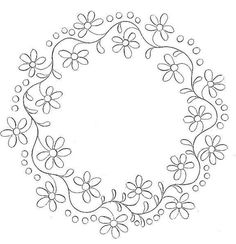 a circular frame with flowers on it