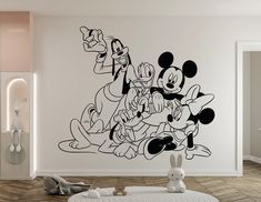 mickey mouse and friends wall decal in a children's room