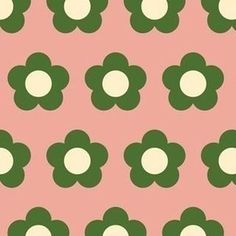 a pink and green flower pattern with white dots on the center is featured in this image