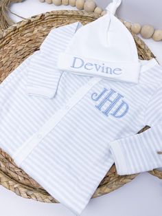 Picking out the first outfit you put on your little one is such a hard decision, but we make it easy. Our monogrammed coming home outfit makes the perfect first outfit for your little guy. The sleeves have foldover fabric to cover their fingers to prevent them scratching their face. It's made of 100% cotton and is really soft. Choose between the light blue and white or grey and white and you can get a matching monogrammed hat. -Keep in mind most double names won't fit on a hat. For example John Monogram Baby Onesie, Personalized Onesie Boy, Baby Boy Onsies Cricut Monogram, Baby Boy Jon Jon Outfit, Boys Monogrammed Onesie, Hard Decision