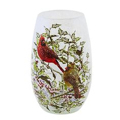 a glass vase with two birds painted on it