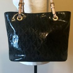 Excellent Condition. Hardware Color Is Gold. Lining Is Very Clean And Inside Of Bag Features Multiple Pockets. Outside Of Bag Features A Pocket On The Back. Length Is 11 1/2 Inches, Height Is 10 Inches, And Width Is 7 Inches. (All Measurements Are Approximate) Open To Reasonable Offers. Purse Looks Literally Brand New. Only Used A Couple Of Times. Michael Kors Black Shoulder Bag With Leather Handles, Michael Kors Black Bag With Leather Handles, Bags Michael Kors, Michael Kors Black, Michael Kors Bag, Michael Kors Monogram, Womens Tote Bags, Leather Tote, Patent Leather