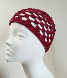 Inspired by the boho chic and disco styles of the 1970's, this dark red crochet skull cap will put you in the party mood. If you're planning a night out, or going off to a festival or concert, this skull cap adds a stylish, retro touch to your outfit. Hand crafted with high quality, fine 100% cotton yarn, this chequered/ granny square effect mesh skull cap has a metallic red thread running through the design for extra glitter and sparkle. The edge is decorated with matching red glass pearl beads Red Crochet Hat For Beach, Red One-size Crochet Hat For Beach, One-size Red Crochet Hat For Beach, One-size Red Crochet Hat For The Beach, Adjustable Red Crochet Hat, Adjustable Red Crochet Yarn Hat, Handmade Red Crochet Hat For Festival, Red Adjustable Bohemian Crochet Hat, Red Crochet Hat, One Size Fits Most