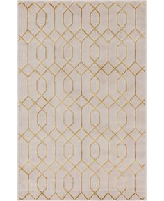 a white rug with gold geometric design on the front and back of it's surface