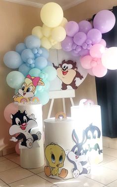 some balloons are in the shape of cartoon characters