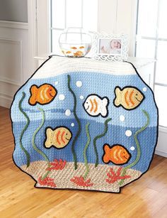 a child's play tent with fish on it