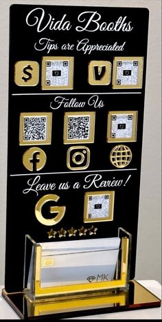 a black and gold business card holder with qr code on the front that says, via beach's tips are appreciated follow us leave as a return