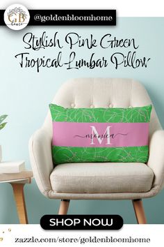 a green and pink pillow sitting on top of a chair next to a white chair