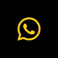 a black and yellow phone with the text whatsapp on it in a speech bubble