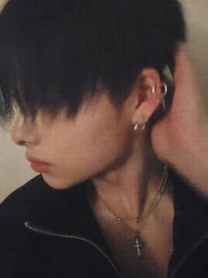 a person with ear piercings on their ears