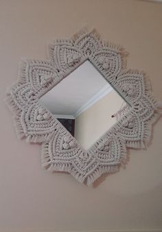 a mirror that is hanging on the wall