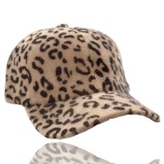 Dani & EmFuzzy Leopard Baseball Cap An adorable faux fur fuzzy leopard baseball cap.This super stylish cosy hat will keep you looking good and feeling warm. Comfortable and fashionable and perfect for casual wear, daily wear, outer wear, work wear, travel, and sport’s. Features a soft faux fur material which will keep your head warm and adds that special accent touch to any favorite top, sweater, jeans, winter coat, jacket, vest, scarf or more. An absolutely gorgeous addition to any wardrobe! One Size - Circumference: 56cm-60cm/22.0"-23.6"; Adjustable; Great fit for most teens and adults. Design : The leopard print baseball hat features an all over leopard print design Trendy Brown Baseball Cap For Winter, Trendy Brown Winter Baseball Cap, Trendy Winter Flat Cap Baseball Cap, Trendy Winter Baseball Cap With Curved Brim, Trendy Winter Baseball Cap, Casual Faux Fur Beanie Hat, Casual Faux Fur Beanie, Casual Hats With Adjustable Faux Fur Lining, Casual Adjustable Hat With Faux Fur Lining