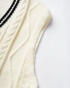 Details: Knitted vest with cable designTop Length: NormalSleeve Length: SleevelessMaterials:95% Polyester + 5% Spandex Cream Winter Vest, Cream Sleeveless Vest For Winter, Cream Sleeveless Winter Vest, Fitted Cable Knit Sleeveless Sweater Vest, Fitted Sleeveless Cable Knit Sweater Vest, Cozy Cable Knit Sleeveless Sweater Vest, Cozy Sleeveless Cable Knit Sweater Vest, Fitted Cable Knit Sleeveless Vest, Fitted Sleeveless Cable Knit Vest