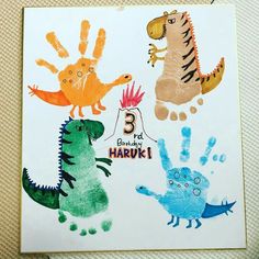 two handprints of different animals and numbers on a piece of paper that says happy 3rd birthday hanukkah