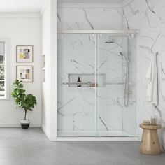 Stylish and sophisticated, the Toledo soft-close, sliding shower door is sure to add a touch of luxury to your bathroom space. The door panels have a modern frameless design with oversized horizontal bar handles, aluminum top track and profiles, and clear 5/16-in (8mm) thick tempered glass panels that open both ways in a bypass sliding motion. The easy-clean Toledo shower doors are available in widths of 48-in and 60-in, and can be purchased in either polished chrome, satin nickel or matte black Shower Door Privacy, Bathroom Redecorating, Bathroom Shower Panels, Standing Shower, Full Bathroom Remodel, Frameless Sliding Shower Doors, Satin Nickel Hardware, Shower Wall Panels, Guest Bathrooms