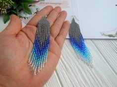 This is a long beaded earrings to the shoulders.  Such earrings are a vivid addition to the dress or summer blouse. Long earrings are becoming more popular and fashionable. It is also a great gift for someone close or for yourself. The earrings are packed in gift wrap, so they are ready for a gift. The earrings are made of Czech beads . The length of the earrings is 11,5 cm or 4,35 inches.(without taking into account the hook) Width of 2 cm or 0,8 inches. If you want a different color or size, w Summer Festival Beaded Fringe Tassel Earrings, Summer Festival Tassel Earrings With Beaded Fringe, Summer Party Beaded Fringe Earrings, Summer Tassel Earrings With Round Beads Fringe, Elegant Colorful Beaded Tassel Earrings For Festivals, Elegant Beaded Tassel Earrings For Summer, Elegant Festival Tassel Earrings With Colorful Beads, Elegant Colorful Beaded Tassel Earrings For Summer, Elegant Colorful Beaded Earrings For Summer