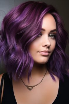 If you want to add a pop of color to your shoulder-length hairstyle, go for vibrant purple highlights. These edgy fashion highlights complement roots and can be maintained with a shampoo that’s safe for colored hair. Click here to check out more cute & fun shoulder-length haircuts & hairstyles. Vivid Hair Color Medium Length, Purple And Magenta Hair Highlights, Shoulder Length Colorful Hair, Royal Purple Hair Color, Classy Purple Hair, Medium Length Haircut Ideas For Women, Fun Shoulder Length Hairstyles, Vivid Balayage Hair, Purple And Copper Hair