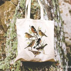 "This cute, nature-themed durable canvas tote is perfect for every day use. FEATURES ✦ * Design printed on both sides * Material: 100% cotton * Size: 15\" x 16\" * Handle Length: 20\" PRODUCTION + SHIPPING ✦ Each tote is made to order. Production typically takes 1-4 business days and shipping takes 3-5 business days. (US) **Shipping is FREE for orders over $35! CARE INSTRUCTIONS ✦ * Machine wash: cold (max 30C or 90F) * Non-chlorine: bleach as needed * Tumble dry: medium heat * Do not iron directly over the printed area - print may stick to the iron. * Heavy fabric (12 oz/yd² (406.9 g/m SPECIAL REQUESTS ✦ Looking for a different color or other customization? Shoot us a message and we will be happy to work with you! RETURNS + EXCHANGES ✦  We do our very best to create products you will love Botanical Canvas Bags For Everyday Use, Botanical Style Canvas Bags For Everyday Use, Botanical Cotton Canvas Bag For Everyday Use, Canvas Book Bag, Cottagecore Gifts, Art Tote Bag, Wild Bird, Nature Themed, Book Bag