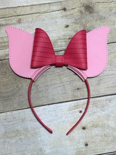 a pink and red mouse ears headband