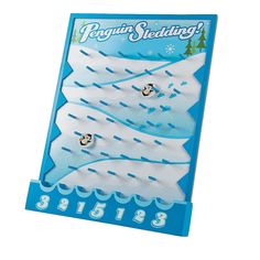 the penguin sledding game is shown in blue and white with penguins on it