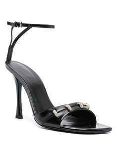 Step out in style with these black calf leather sandals featuring a square open toe, crystal embellished decorative stitching, and a high stiletto heel. The branded leather insole and gold-tone hardware buckle-fastening ankle strap add a touch of luxury to any outfit. Black calf leather Square open toe Crystal embellished decorative stitching Branded leather insole High stiletto heel Leather sole Gold-tone hardware buckle-fastening ankle strap Decorative Stitching, Outfit Black, Black Leather Sandals, Prada Designer, Givenchy Women, Sandals For Sale, Stitching Leather, Stiletto Heel, Womens Backpack