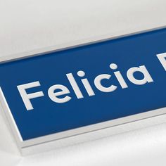 a blue and white sign that says felicia park