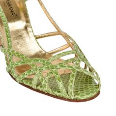 Guaranteed authentic Dolce&Gabbana fresh green snakeskin strappy shoes.Thin straps create a woven design across the toe of the slingback shoe.Shaped heel. Please see the same shoe in black satin listed.final saleSIZE 37.5USA SIZE 7.5SHOE MEASURES:HEEL 4"UPPER SOLE 9.74"CONDITION:MINT Strappy Shoes, Dolce Gabbana Shoes, Slingback Shoes, Woven Design, Fresh Green, Black Satin, Snake Skin, Dolce And Gabbana, Size 7