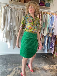 Dosa Green Silk Wrap Skirt. A fun and bright knee-length skirt in a grass green textured silk. Gives a modern-luau vibe! Interior is lined in a gorgeous patchwork stitched pattern, so the skirt could potentially be worn reversible as well! Wrap ties at the waist, allowing for an adjustable fit. Marked one size, but best fits a size M/L. 100% silk, dry clean only. Made in the USA. In excellent, like-new condition. Approx. Measurements: Adjustable waist: 15" through 18" laid flat across Length: 21 Fitted Green Skirt For Spring, Green Knee-length Party Skirt, Green Pleated Tiered Mini Skirt, Green Knee-length Mini Skirt For Summer, Green Knee-length Skirt For Party, Green Flowy Mini Skirt, Spring Green Gathered Skirt, Chic Green Tiered Mini Skirt, Green Relaxed Mini Skirt For Summer